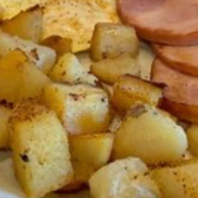 CANADIAN STYLE BACON WITH TWO EGGS.