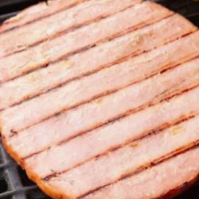 HAM STEAK WITH TWO EGGS.
