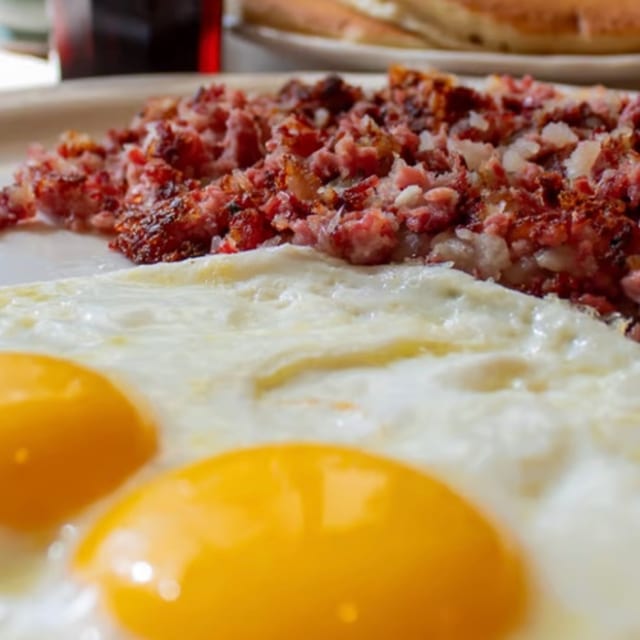 OUR FAMOUS CORNED BEEF HASH WITH TWO EGGS.