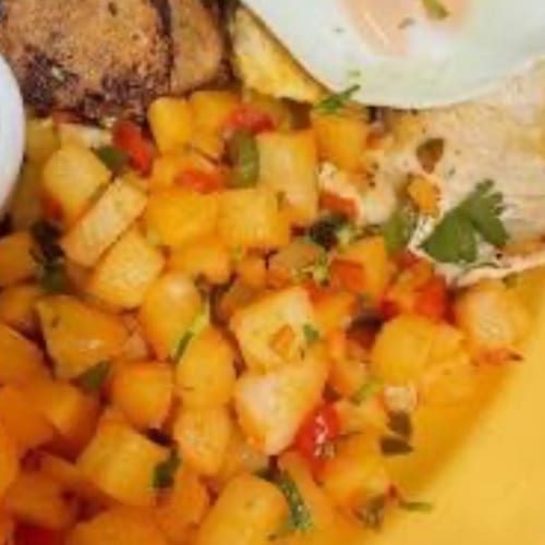 GRILLED CHICKEN BREAST WITH TWO EGGS.
