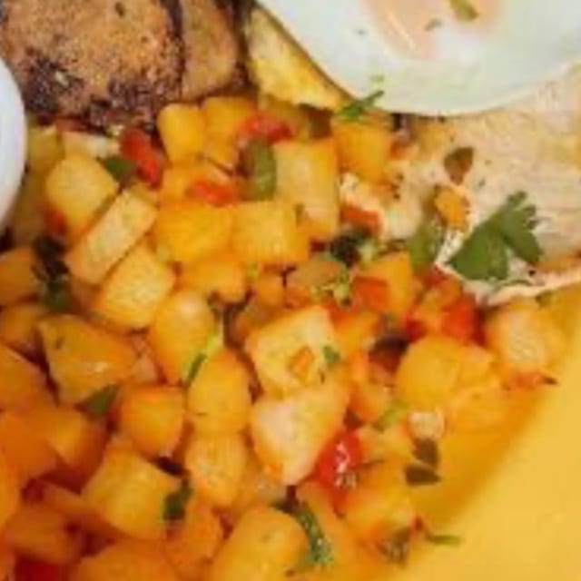 GRILLED CHICKEN BREAST WITH TWO EGGS.